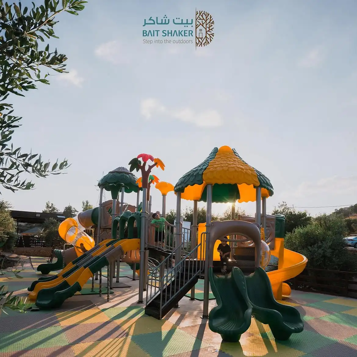 The colourful outdoor kids' play area at Bait Shaker near Amman
