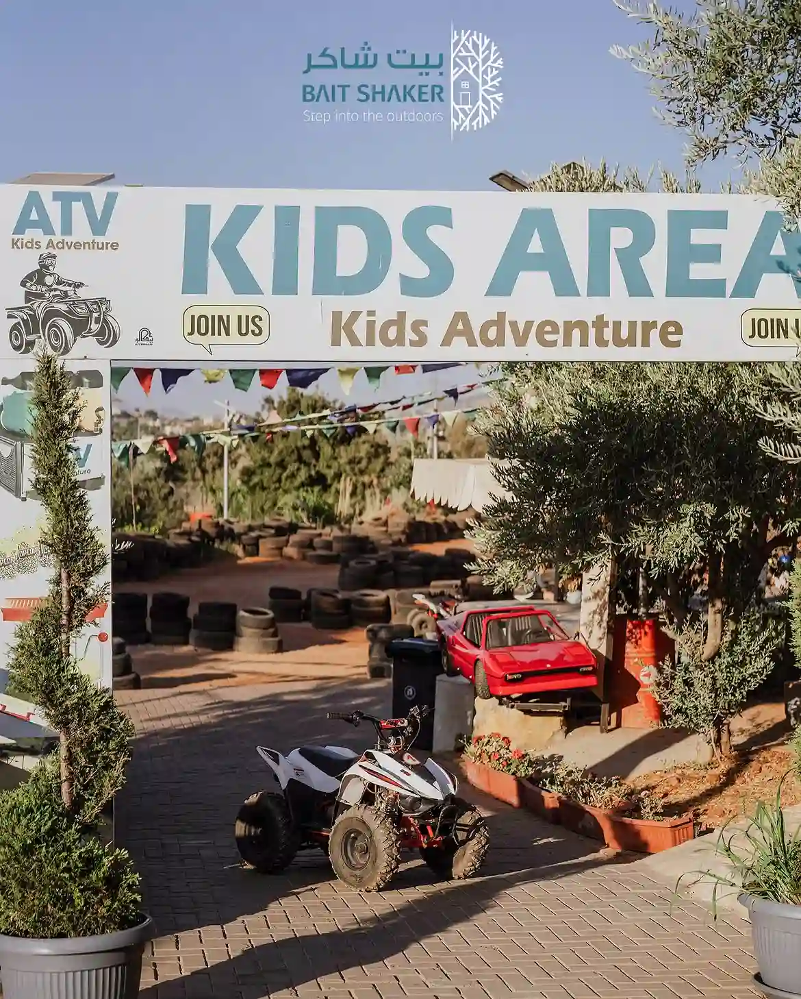 Kids Area entrance at Bait Shaker with a kids' ATV parked, a family day out near Amman